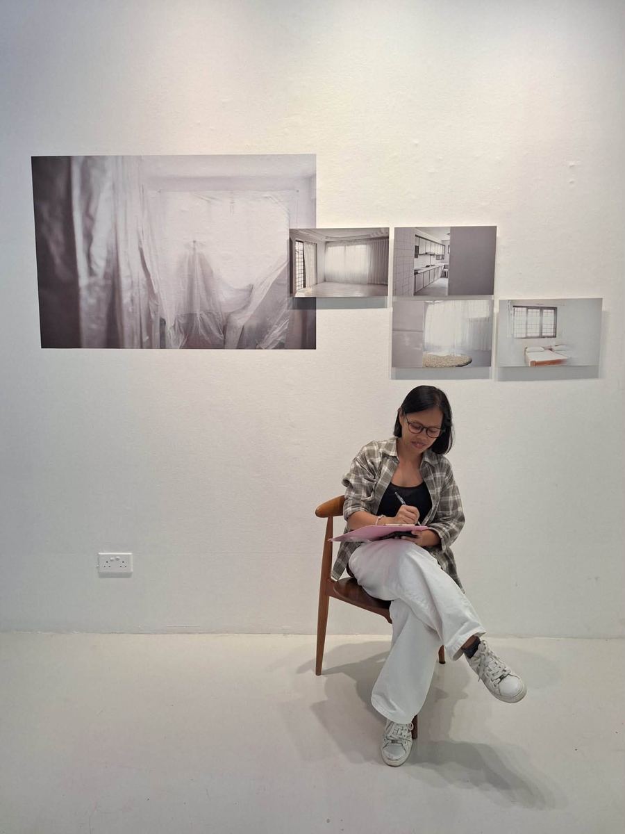 Participant writing at an MWS workshop, [NAME / DESCRIBE]